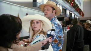 (L-r) The holiday escape plans of Kate (REESE WITHERSPOON) and Brad (VINCE VAUGHN) are thwarted when they are cornered by a reporter at the airport in New Line CinemaÕs romantic comedy, ÒFour Christmases,Ó distributed by Warner Bros. Pictures. "PHOTOGRAPHS TO BE USED SOLELY FOR ADVERTISING, PROMOTION, PUBLICITY OR REVIEWS OF THIS SPECIFIC MOTION PICTURE AND TO REMAIN THE PROPERTY OF THE STUDIO. NOT FOR SALE OR REDISTRIBUTION."